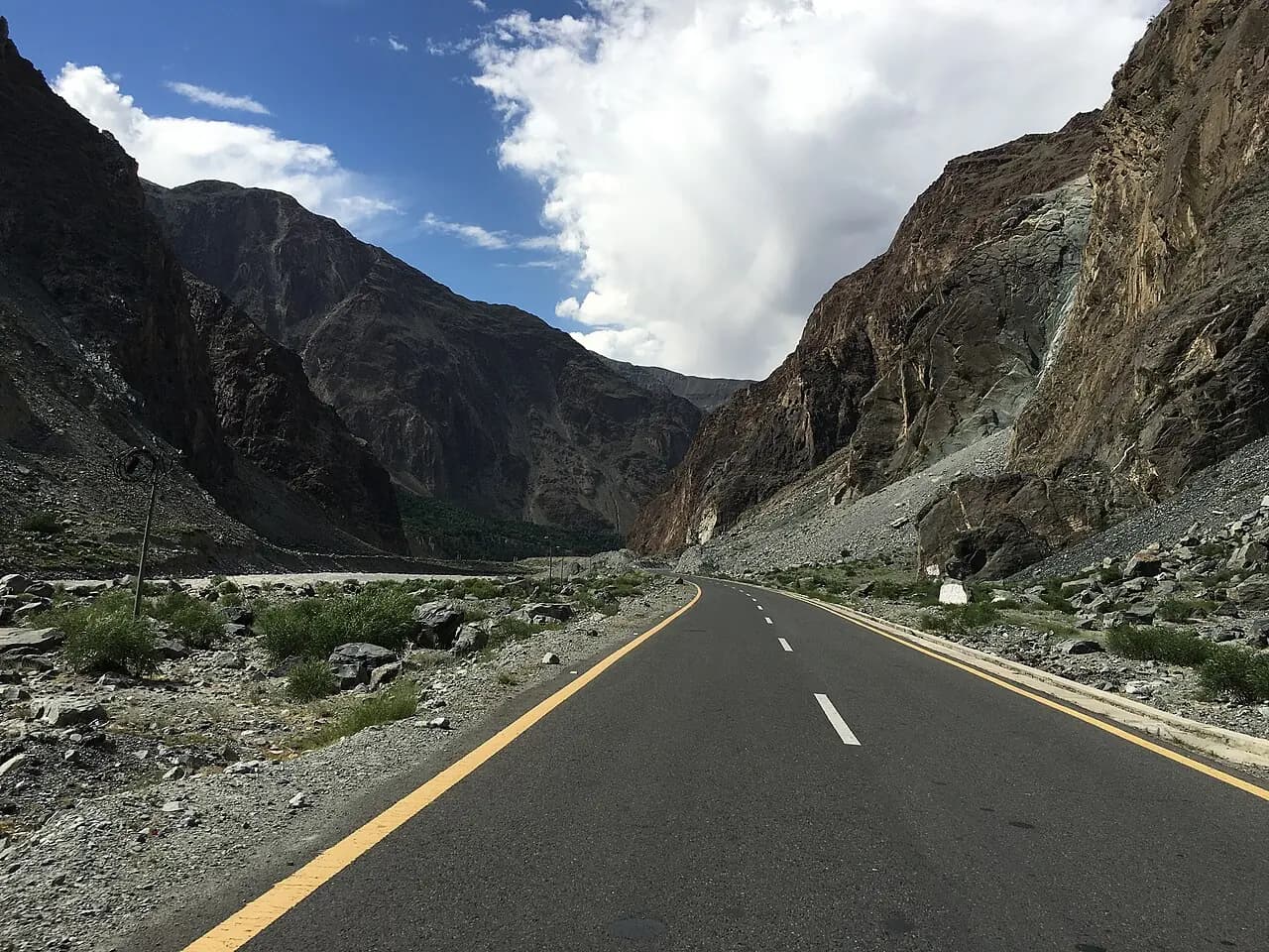Karakoram Highway winding between mountain slopes
